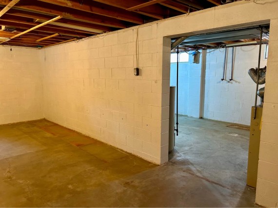 Clean Dry Solid Concrete Block Full Basement = Two Heated Recreation Rooms