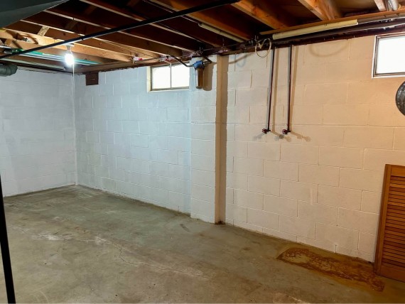 Clean Dry Solid Concrete Block Full Basement = Two Heated Recreation Rooms